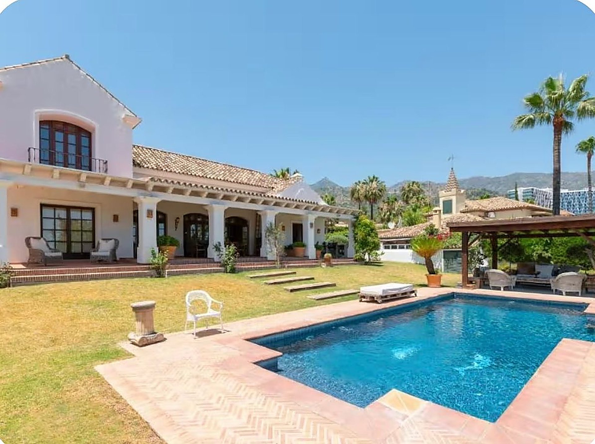 The retreat villa with its private pool and lawn in the hills near Marbella